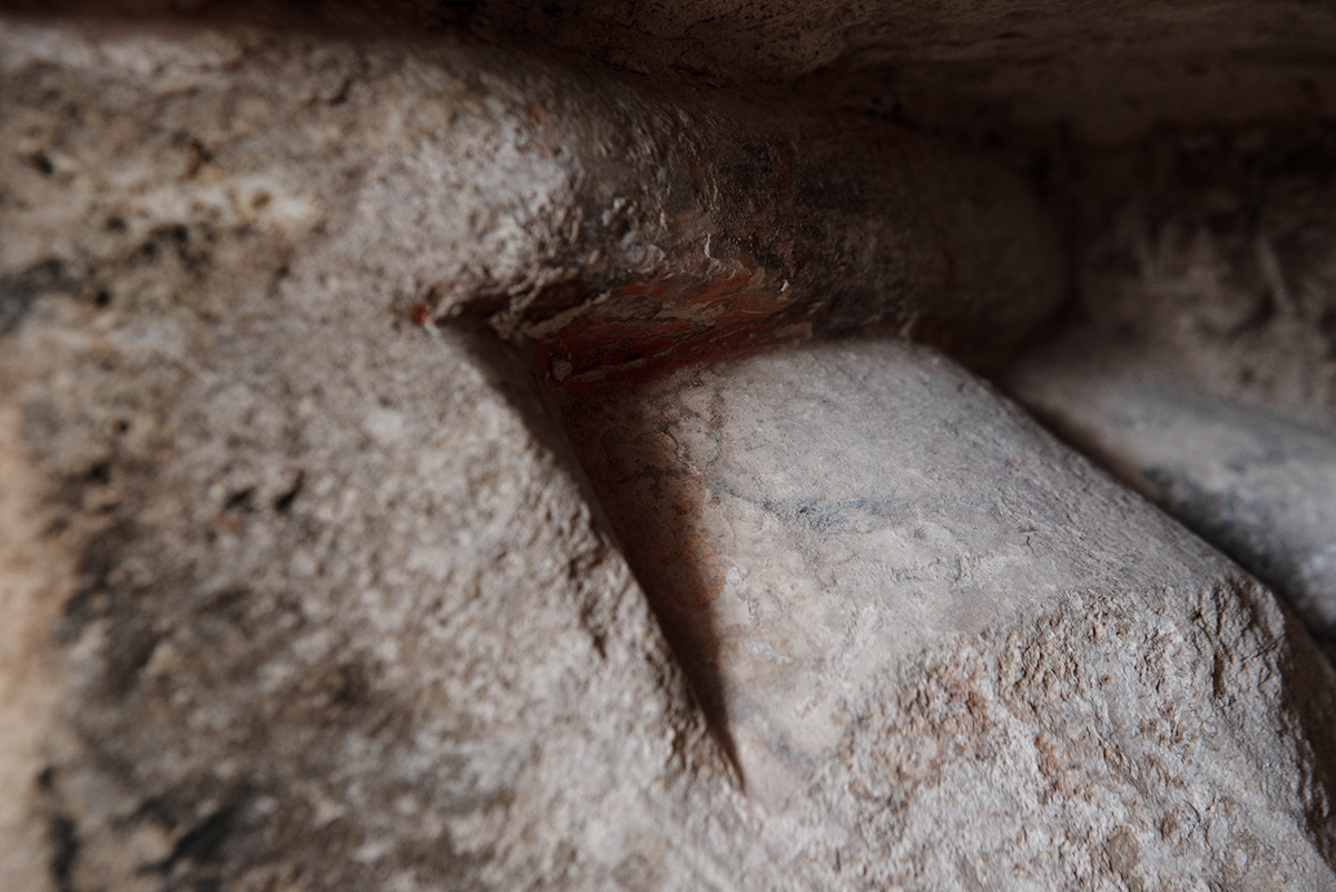 This week our stonemasons made an incredible discovery of a stone from the original Norman Cathedral, repurposed into the South side wall. The stone would have originally been part of a scalloped capital and remnants of the Norman paintwork of the Cathedral can still be seen.