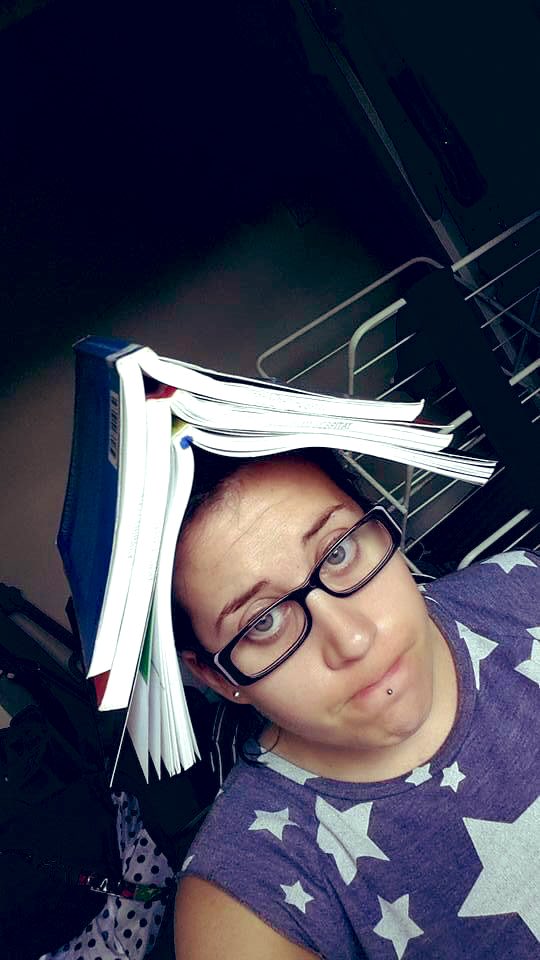 LisaJJohns's tweet photo. The reality of studying, I remember having a streak of feeling completely stuck and overwhelmed doing my OT Degree. Wearing my books on my head was the most productive thing to do with them! #OTStudy #AcademicReality https://t.co/FcKTUwdZCI
