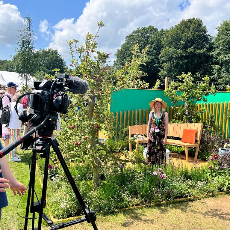 petrus_cmty's tweet photo. In front of the camera again for @The_RHS Youtube channel! 🎥 The Empowerment Garden is an example of our #socialprescribing work and was designed and built by people benefiting from these services. Rachael will explain how it all comes together 🌱 @NASPTweets https://t.co/WRROM5Hz7v