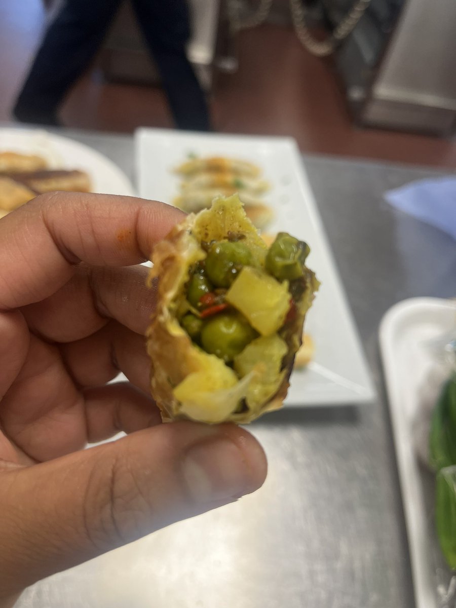 pardeep19922328's tweet photo. Yum yum. How is your Friday going? 
Today trainees learnt how to make samosas and spring rolls using filo pastry sheets. Samosa was filled with diced curry potatoes and Spring rolls with stir fried vegetables 👌🏻👌🏻 
#anotherdaydone #loveteaching #takeprideinyourwork 👌🏻👌🏻 https://t.co/0VKnz45dU4