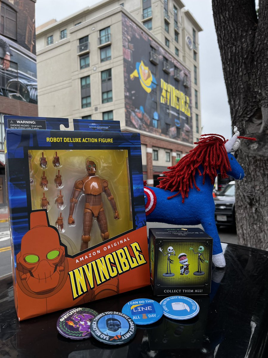 SD_Comic_Con's tweet photo. The Super Prize Mules are on the loose! Catch Captain Americorn at 5th and K for this #Invincible Robot deluxe figure or Nightmare Before Christmas blind box from @CollectDST! 
Say “I am Invincible” to win the #adventuresofprizemule! #sdcc https://t.co/HdpXt5ZyIp