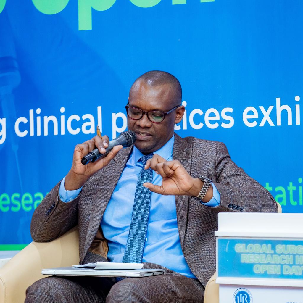 <a href="/Fostino21/">Prof. Faustin NTIRENGANYA</a> <a href="/NIHR_GSU/">NIHR Global Surgery</a> <a href="/RwandaHealth/">Ministry of Health | Rwanda</a> <a href="/Uni_Rwanda/">University of Rwanda</a> <a href="/RBCRwanda/">Rwanda Biomedical Centre</a> <a href="/Surgical_RW/">Rwanda Surgical Soci</a> <a href="/RwandaFDA/">Rwanda Food and Drugs Authority</a> Panel Update:  Dr. JC Allen Ingabire presents the CHEETAH trial, targeting Surgical Site Infections (SSI) in low- and middle-income countries. He explained the simple intervention of using separate sterile gloves and instruments during wound closure, potentially reducing SSI and