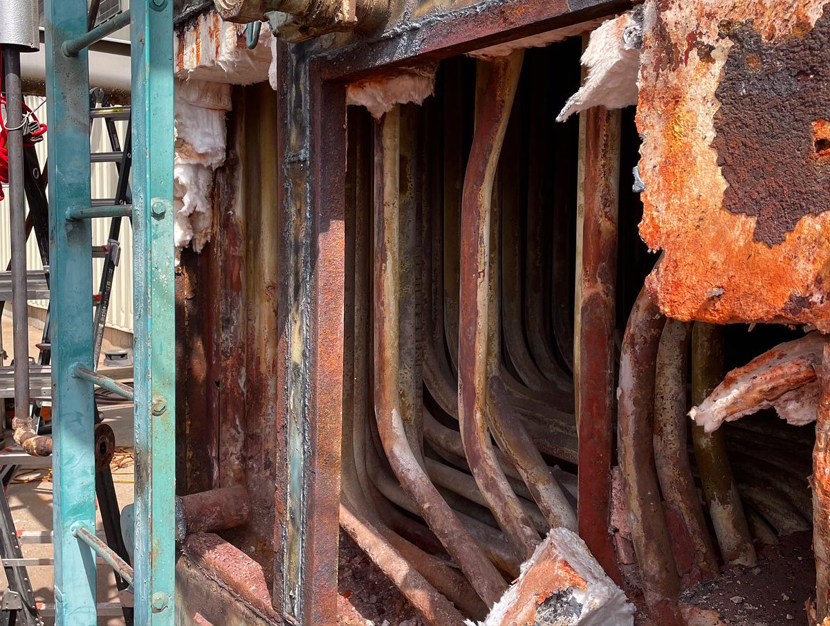 RasMech's tweet image. Our boiler repair team is hard at work tackling a BIG watertube boiler project in Kansas. The project includes recasting, new insulation, and new refractory front and rear walls for this unit. #coderepair #asme #steam #watertube #boilerrepair #industrial