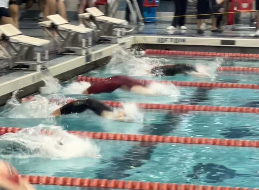 White cap so clean. Gracie K Backstroke start even cleaner.