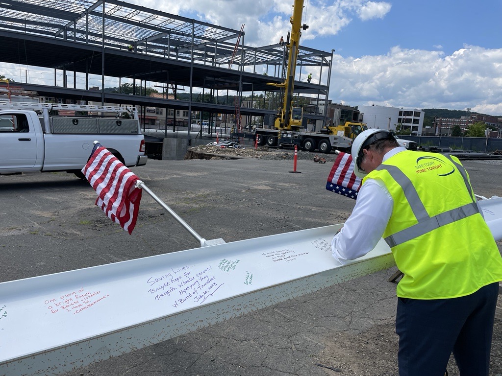 PES_New_England's tweet photo. A great milestone was achieved 7/20 moving steps closer from a vision to reality at the @WheelerHealth  Family Health &amp; Wellness Center in @BristolAllHeart   Dave Aucoin, P.E. was on hand for the beam signing along with @TectonArchitect &amp; @CompanyDownes #mentalhealth https://t.co/d6MirUm91c