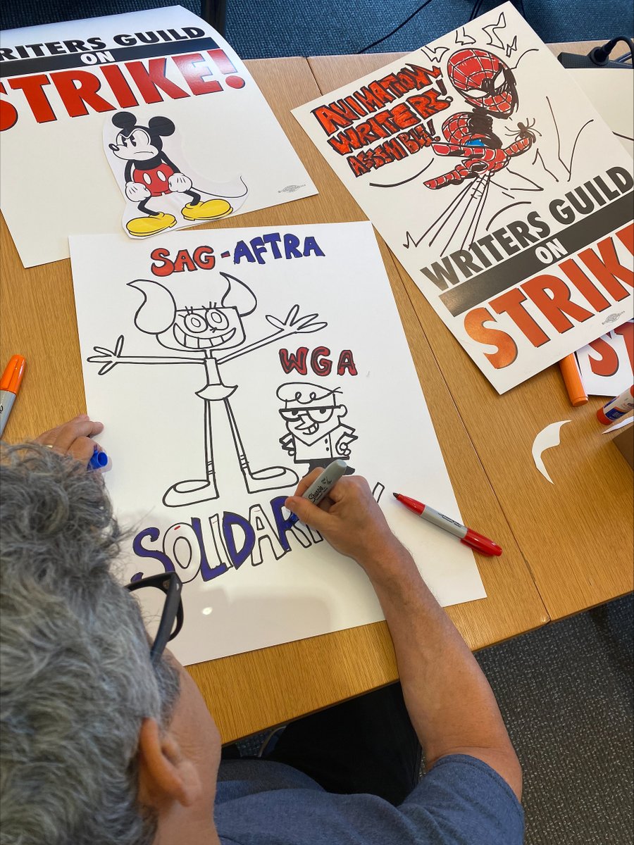 WGAEast's tweet photo. The crew making signs for the upcoming WGAE Animation Picket really showed off 😍 We’re excited to use these next Tuesday, July 25. Join in solidarity with animation writers! ✊

⏰ July 25, 3pm - 6pm 
📍  230 Park Ave South

RSVP: https://t.co/ds1He4bJRl 

#WGAstrike #WGAstrong https://t.co/hFSblZatHq