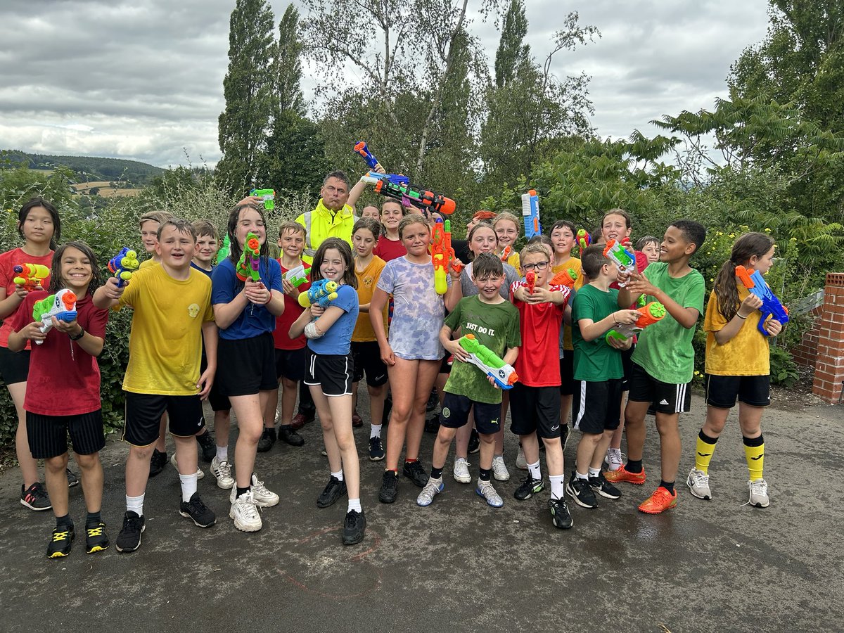 PPSMrsSymes's tweet photo. Water guns at the ready and look who we all bumped into. That was the worse decision Mr T made today. Year 6 took great pleasure in blasting him with litres of water. Shame he hadn’t brought a change of clothes before our final assembly. 😂💦🔫 @PentrepoethPrim @PPSMrsJones https://t.co/kZV87PX90r