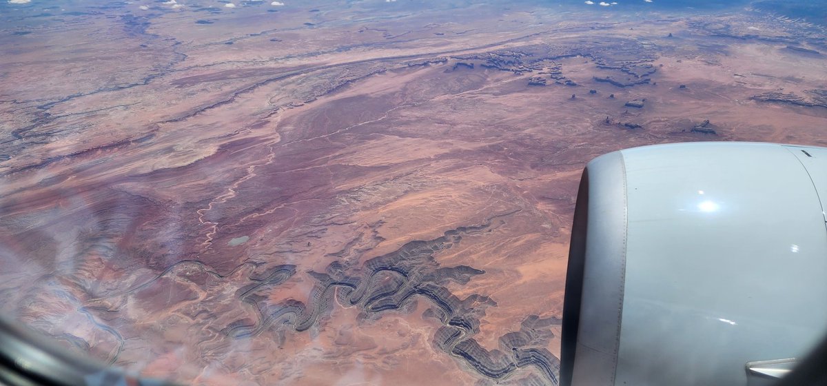 carwalsh77's tweet photo. @walterkirn Big agreement! This was from last week, that magical transition in Nevada/Utah from snow caps to desert. The window shade control is the true negative to the middle seat. https://t.co/Ebo8GuNiAo