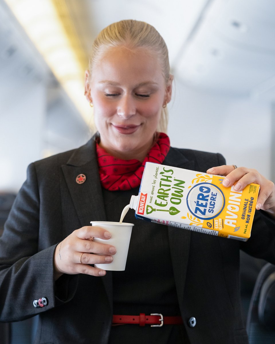 AirCanada's tweet photo. Sip on more of what you love while you soar. Add @earthsowncanada oat milk to your coffee or tea. We’re the first Canadian airline to offer oat milk by request on all flights. https://t.co/69mRDWLshW
