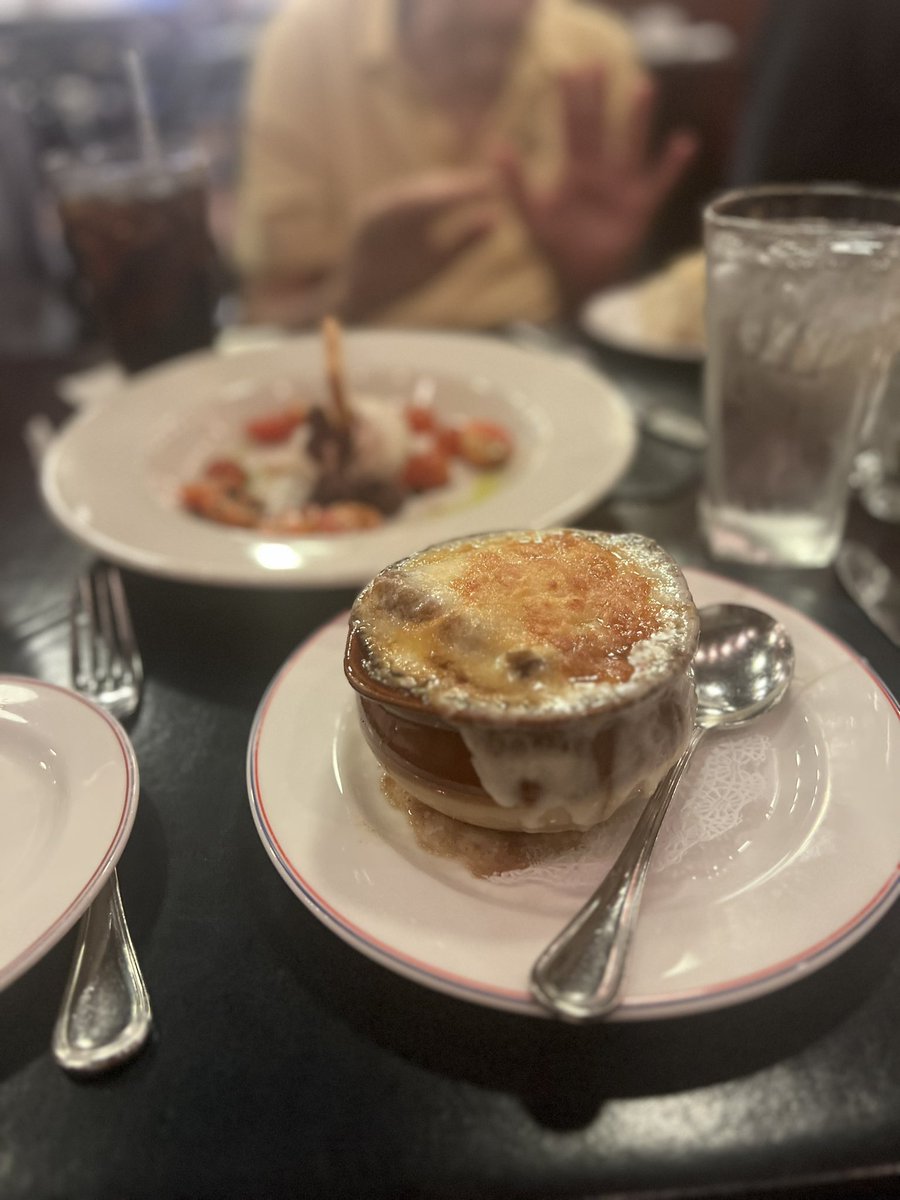 Delicious French onion soup at the Penn Club! Enjoying good conversation. 🍲 #PennClub #FrenchOnionSoup #RelaxingTime