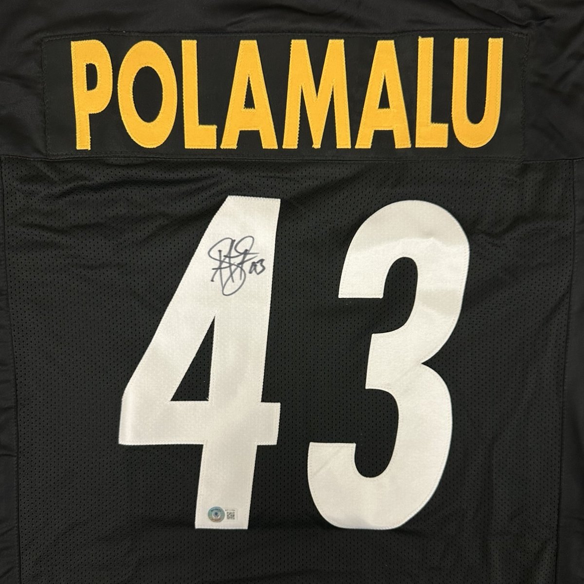 We're going to give a Troy Polamalu autographed jersey away!

For a chance to win:

- Retweet this tweet
- Follow us

We'll pick a winner on Monday 7/24!