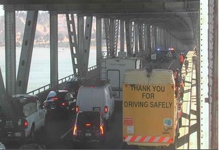 KCBSAMFMTraffic's tweet photo. #RichmondSanRafaelBridge Eastbound Interstate 580 #CHP has all lanes blocked at mid-span and talking to someone in lanes. Traffic is backed up into #MarinCounty #Caltrans #KCBSTraffic https://t.co/IWJPbJ3sy2