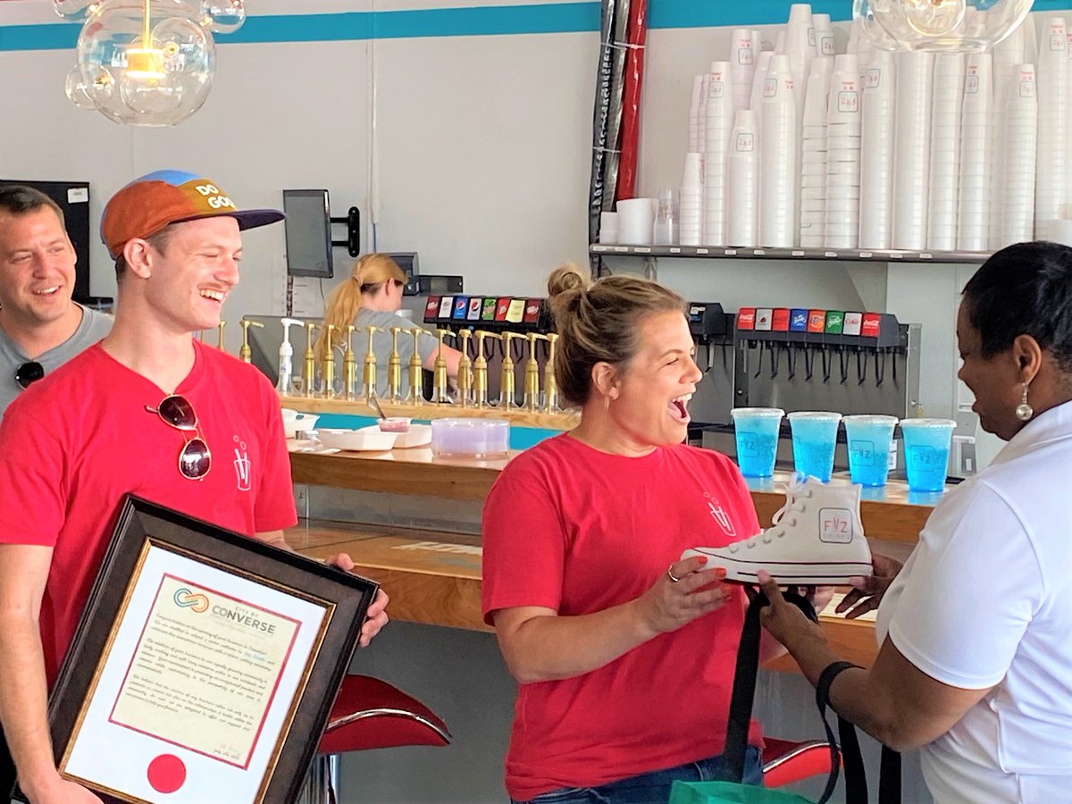 chooseconverse's tweet photo. Welcome to Converse, Fiiz Drinks! We officially welcomed them to our great community with a ribbon-cutting ceremony yesterday. Owner Rachel and family were blown away when we welcomed them to #TeamConverse with a Fiiz-branded Converse shoe and a welcome letter from Mayor Suarez. https://t.co/qtFqo4Z6uh