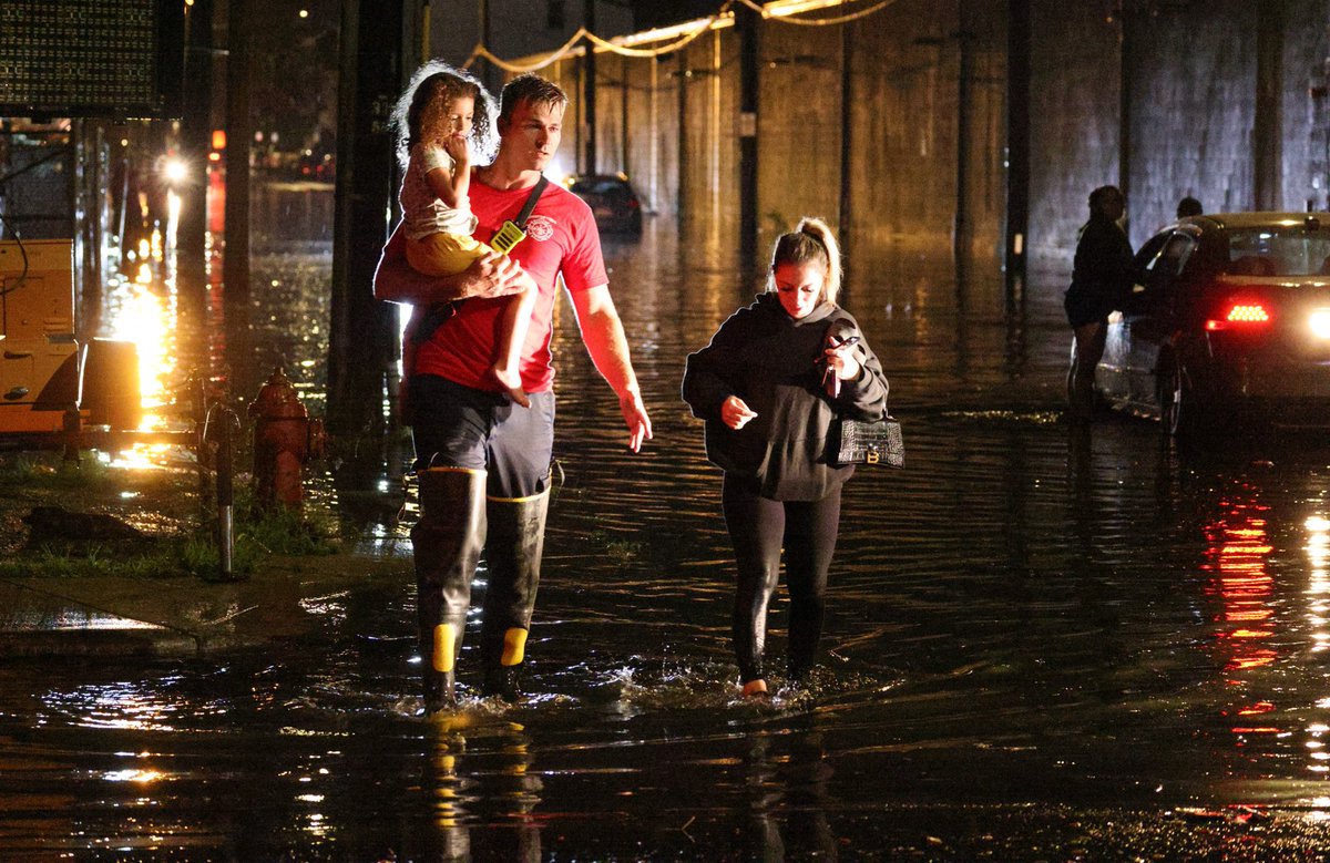 Heavy flooding & lightning in Lynn & Saugus caused flooded roadways. Here, Lynn firefighter Peter Olsen carries Chanel Caruso, age 4, as her mom Nicole walks from their stranded car on Alley St. Lightning strikes in Saugus. Watch ⁦@NBC10Boston⁩ at 11. ⁦@pictureboston⁩