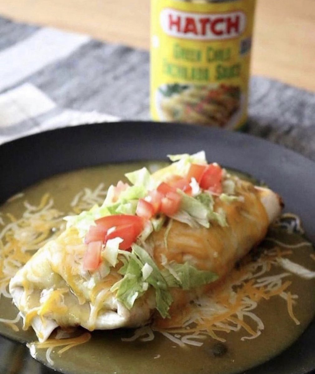 HatchChileCoLLC's tweet photo. Our super easy Smothered Green Chile Bean Burrito is a kid friendly, crowd pleaser.  Using our  HATCH® Enchilada Sauce it’s packed full of flavor.  Make sure you try this and drop us a comment or even a photo. 🌯🔥🥑
Get the recipe here: https://t.co/HoNQXZw9nn https://t.co/z1AWHSGyNy