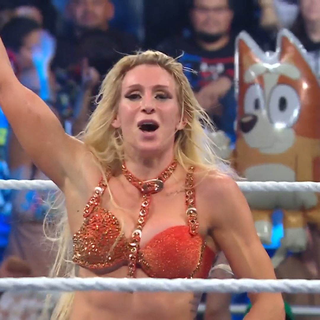 WWE's tweet photo. In a hard-fought encounter, @MsCharlotteWWE defeats Ms. #MITB @Iyo_SkyWWE on #SmackDown! https://t.co/Wcf9lzH16e