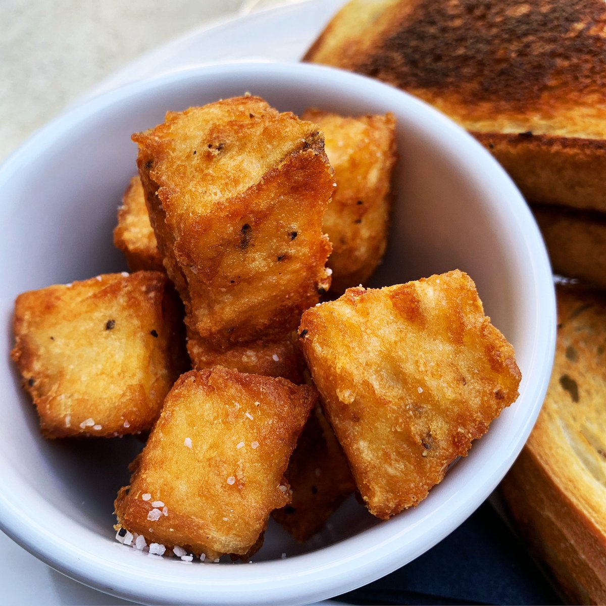 Did you know… our tater tots are handmade and handcut and are the best tots in town? We combine shredded potatoes, mashed potatoes, and the perfect seasoning ➡️ freeze, cut, and fry for these crispy bites to enjoy with lunch or dinner! #tatertots