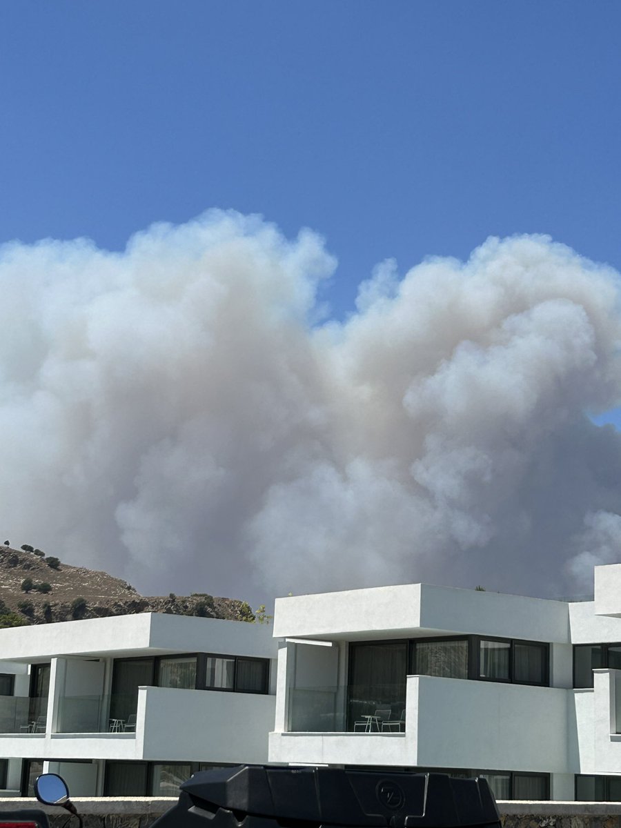 claire_pearsall's tweet photo. Some pretty big smoke clouds from #Rhodes #Wildfires. Me and @NigelNelson leaving here today but wouldnโt be entirely sad if we had to stay longerโฆโฆ #extendedholiday https://t.co/fRkZBsgskm
