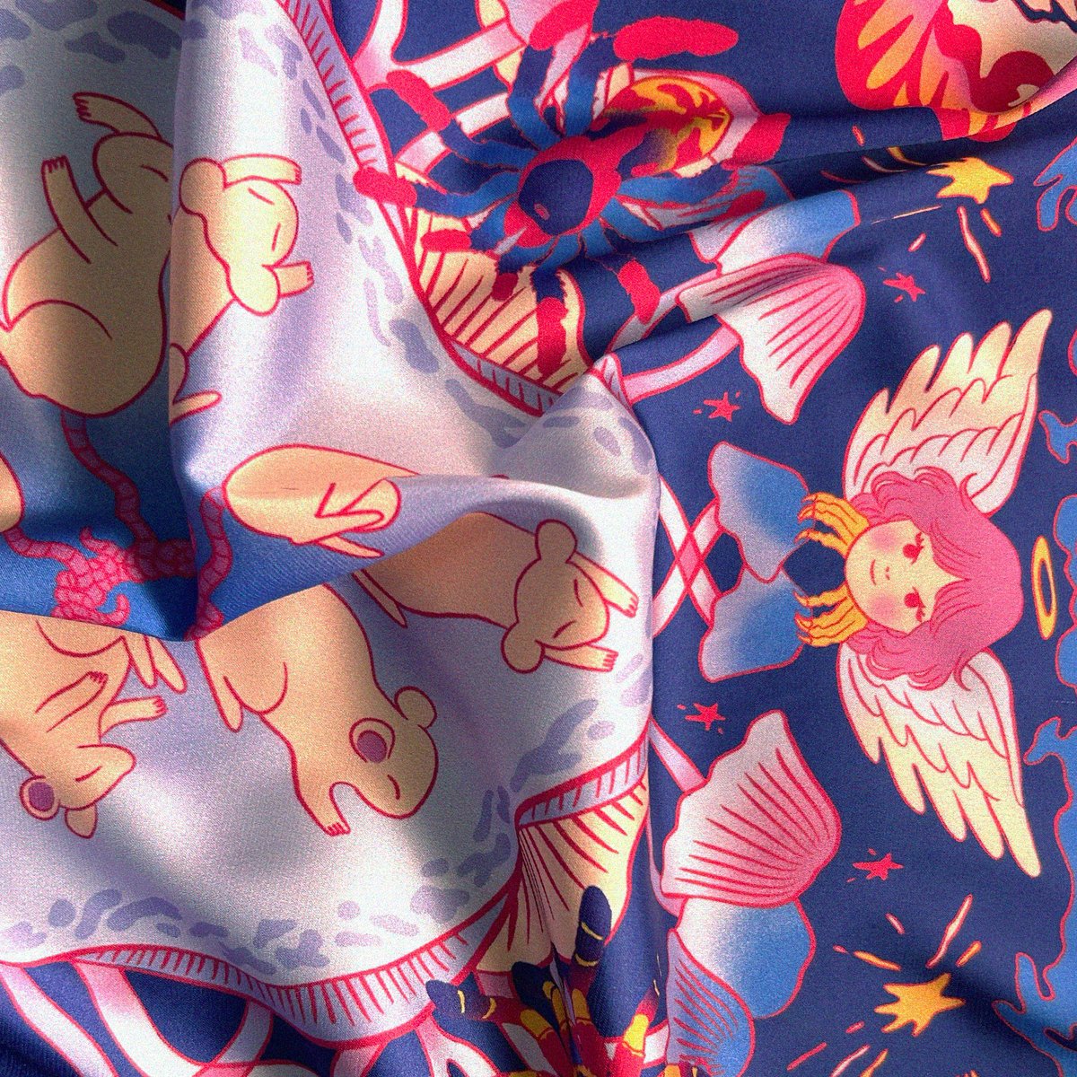 ✨ Channel your free spirit with this limited-edition scarf by Partner and Creative Director <a href="/mialags/">Mia</a>! This whimsical masterpiece transports you to a wonderland of vibrant mushrooms, rat kings, cherubs, and majestic moths.

Featured at the KLIF 🌈💫 #WearableArt #WhimsicalVibes