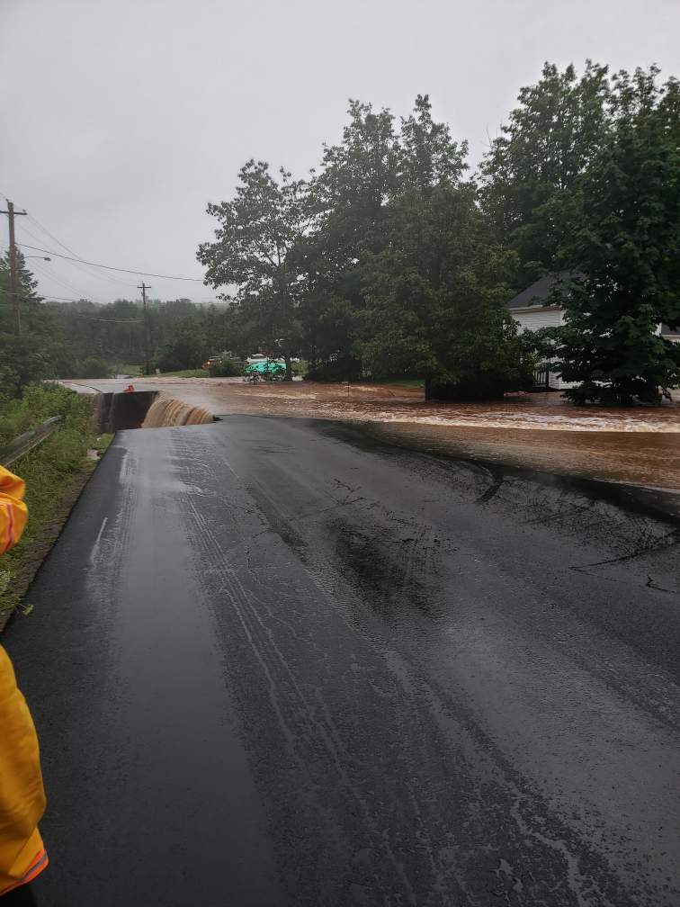 EastHantsNS's tweet photo. Hwy 215 has been washed out near civic #10396 (just South of Rocks Road, Hwy 236). Motorists will have to use an alternate route until Provincial crews are able to make passage safe. 

Follow or call 511 for road closures across Nova Scotia today. https://t.co/HZKjkKKVCg