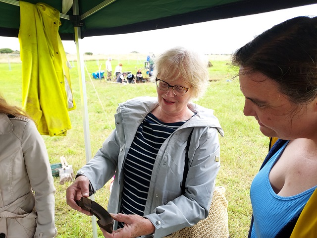 Despite a grim start we were revived by cake-thanks Warren-and lots of interested visitors including Fin O'Carroll and her entourage. Planning ongoing in 5A with completion of topsoil removal in 5B onto stony surface. Small rest and we'll be back on Monday #diggingdrumanagh