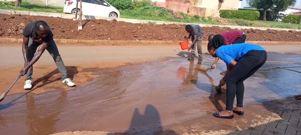 Came very early this morning to make sure we sweep,clean and water the road. Cities can't grow with out supervision of its development projects. Some one is sleeping on duty.
