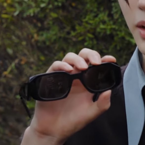 pshmew's tweet photo. sunghoon never losing a pair of airpods, wearing his prada glasses backwards so the logo shows, using another perfume because it smells really good, and adorably showing the prada wallet he’s currently using, everything about him is so endearing 🥹 https://t.co/H31E08dYqx