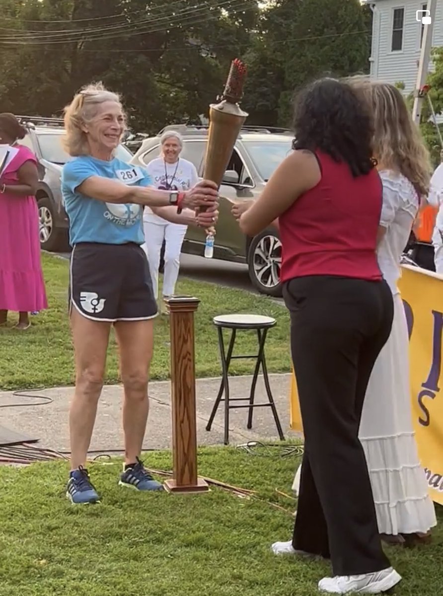 KVSwitzer's tweet photo. So thrilled to pass the torch to the next generation last night in Seneca Falls to officially open the 2023 ERA Convention,for the 100th anniversary of the first ERA convention. I wore the same Women On The Move t-shirt from 1977 torch relay.
#WMISFERAMarch
#ERA
#ERA2023 https://t.co/fkVJLCFUUK