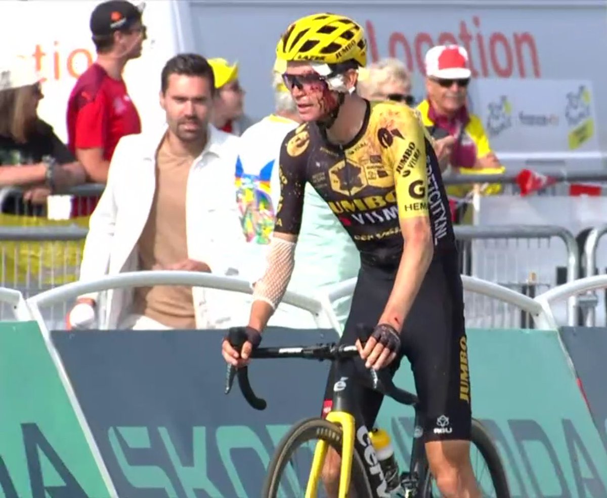 Zombie Sepp Kuss crossing the finish line.