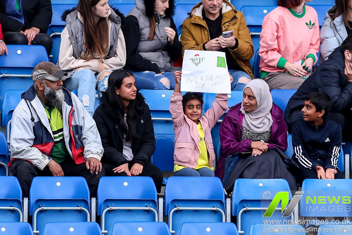 A young Real Betis fan holds up a sign with the Betis logo and the flag of Pakistan with “¡Verdiblancos Por Vida!” translating as “Green and Whites For Life” with Verdiblancos during the Pre-season friendly match Real Betis vs Middlesbrough

(Photo by Ryan Crockett/News Images)