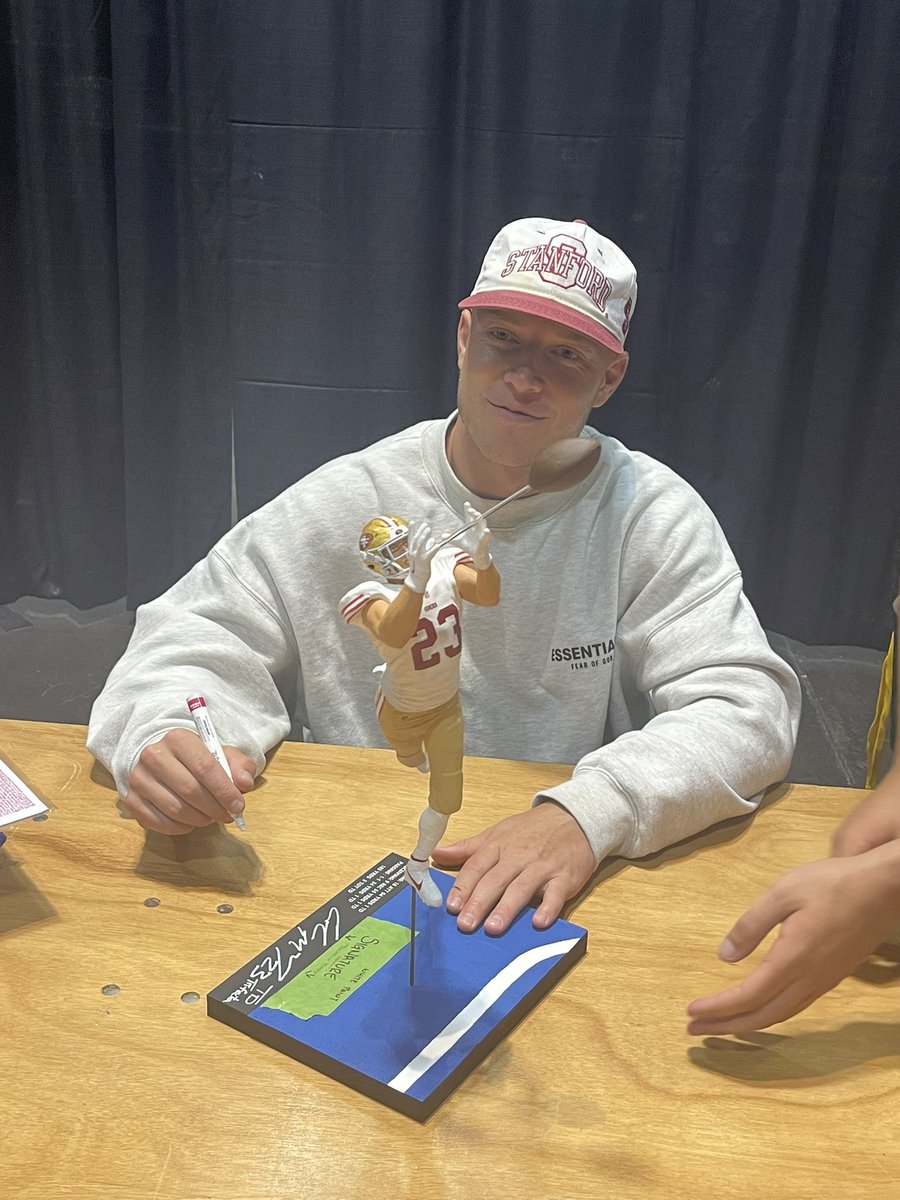 RT @smullanjr: Christian McCaffrey signing the custom figure I had made of him https://t.co/nK6UnuLMVn