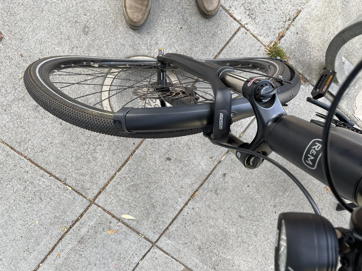 Bike hit at Valencia and 24th by Uber driver making an illegal turn. You can see where the bike got pinned under the car. @SFMTA_Muni @sfbike I’m telling you it’s crazy out here. Sure it’s chill at first but it ramps to 100 super fast at key junctions.