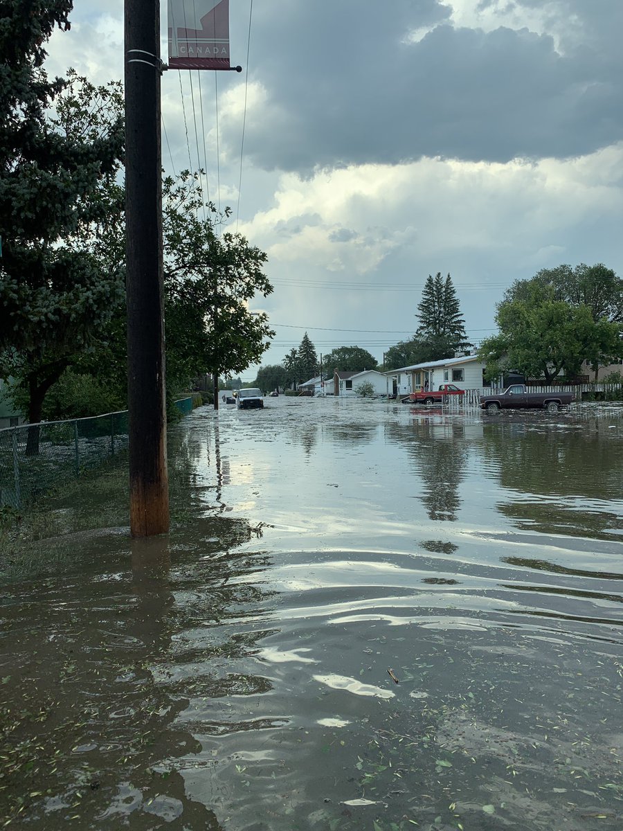 dzammit2's tweet photo. A torrential downpour mixed with some hail hit Swift Current around 6:30 p.m. tonight. #skstorm https://t.co/36wVXu8bXp