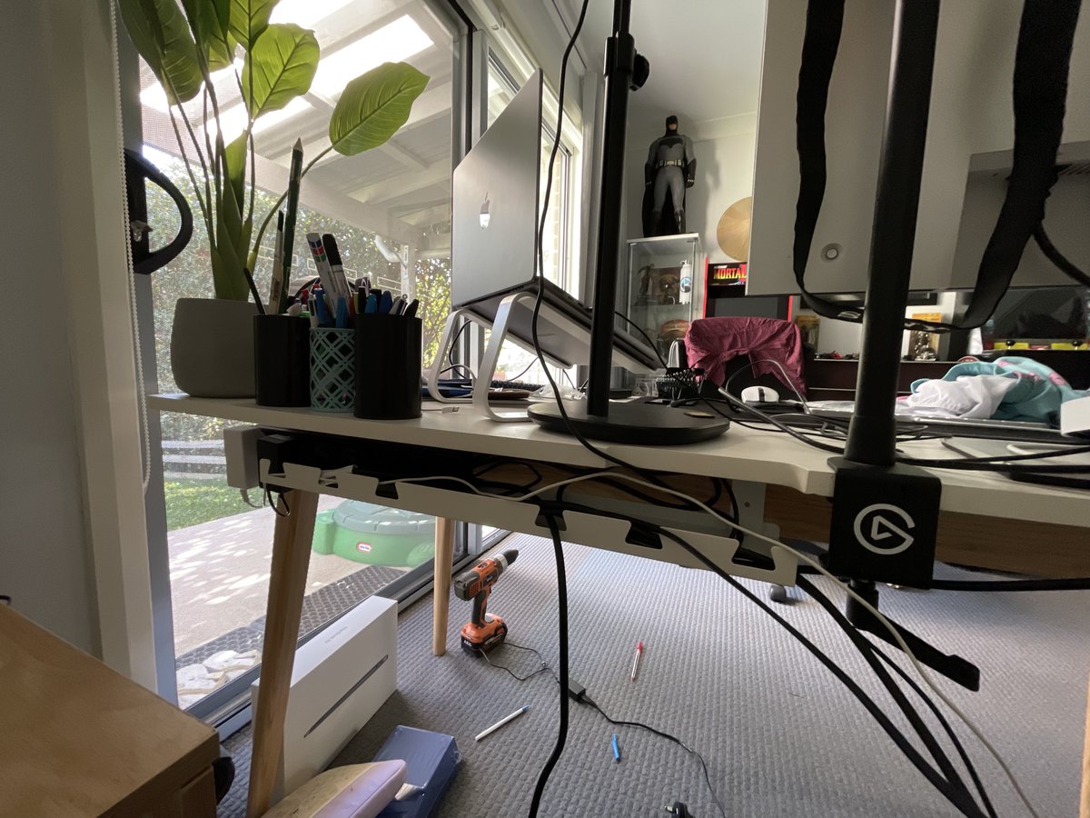 Time for a bit of cable management. Probably not good to use a power board as a foot rest 😂