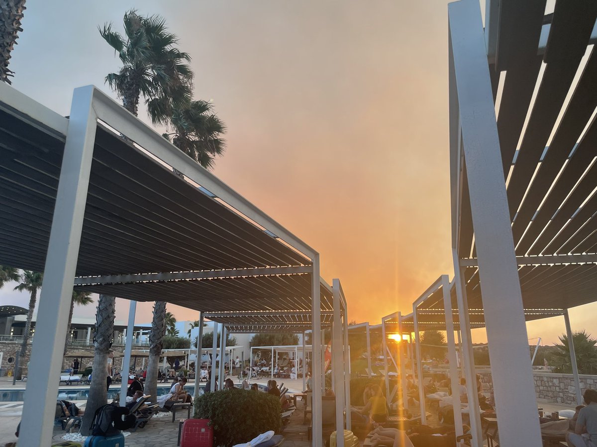 Still on #rhodes on the south side at a hotel after getting on a bus. Slept on sun beds outside with hundreds of other people, woke up to see the fire on the horizon and ash falling on us. Hotel is looking after us but no idea how we are leaving the island yet.