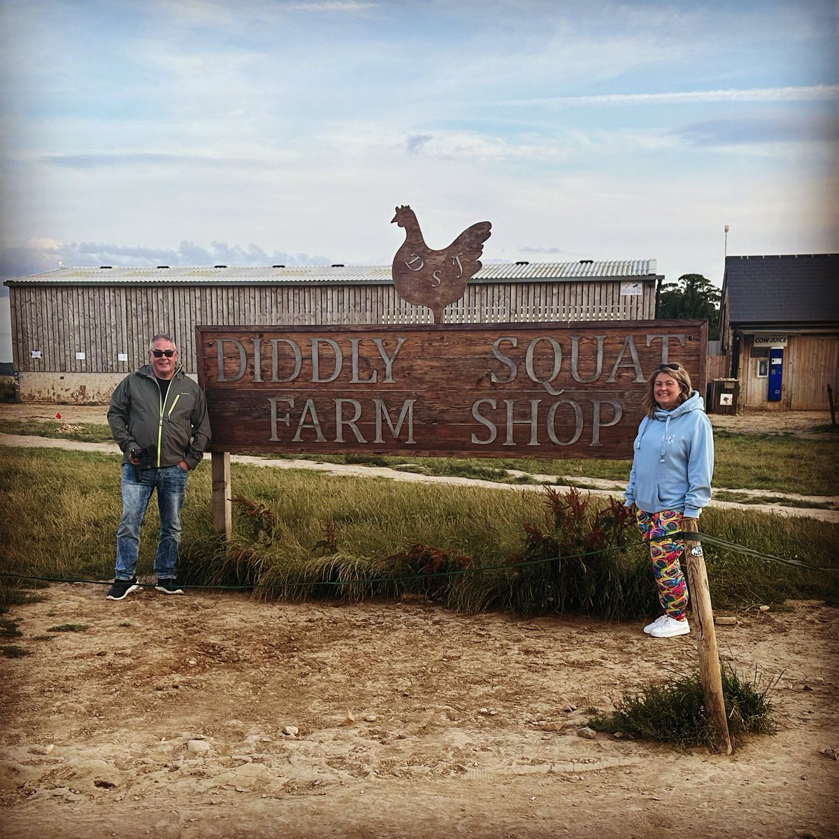We visited Diddly Squat Farm Shop this morning, fortunately we got there early and only queued for around 20 minutes. We spent way too much in there too! Here’s the obligatory photo of Lynds and I with the sign that we took when it was quiet last night. We’re now packing up the
