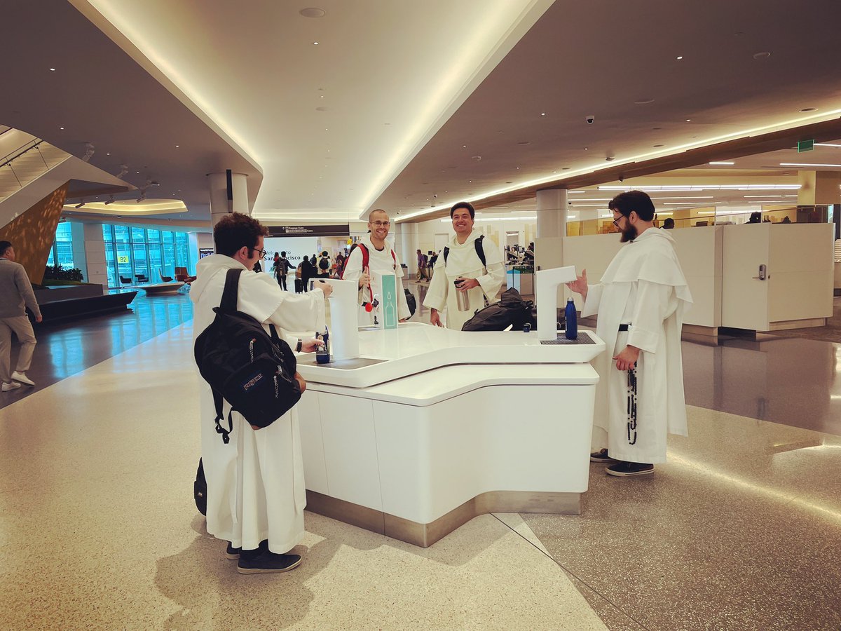 Looking back through some pictures from this past novitiate year, I came across this one of our novices filling up their water bottles at a fancy fountain at @flySFO. Pray for our 5 novices who will profess vows on August 5 in Irving, Texas! #OPsouth #Vocations #Catholic