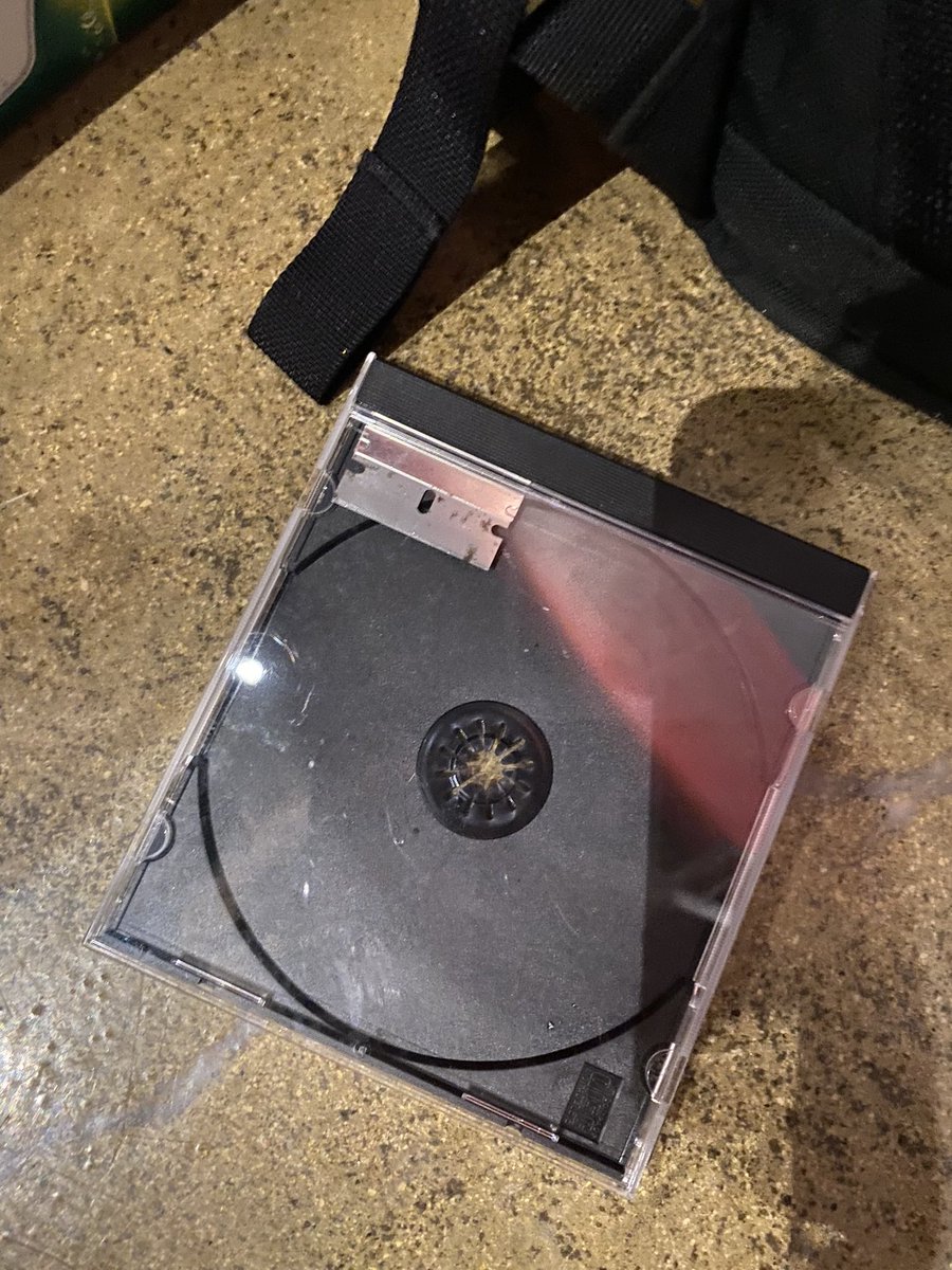 Someone forgot their jewel case with a razor blade in it.