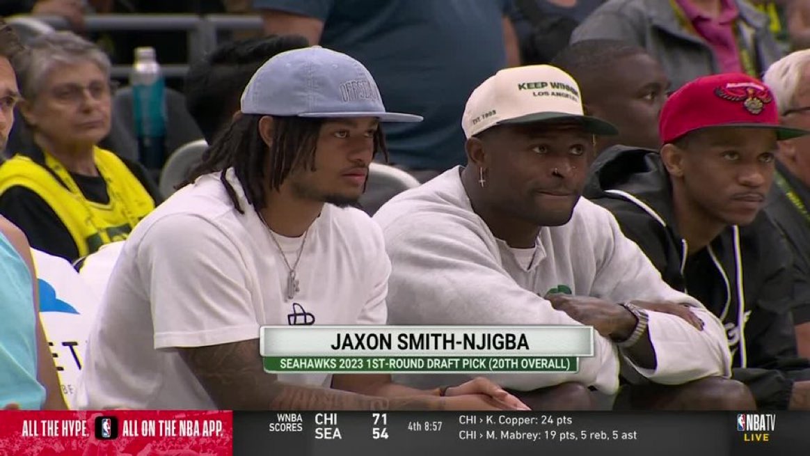 DK Metcalf and Jaxon Smith-Njigba attend Seattle Storm game