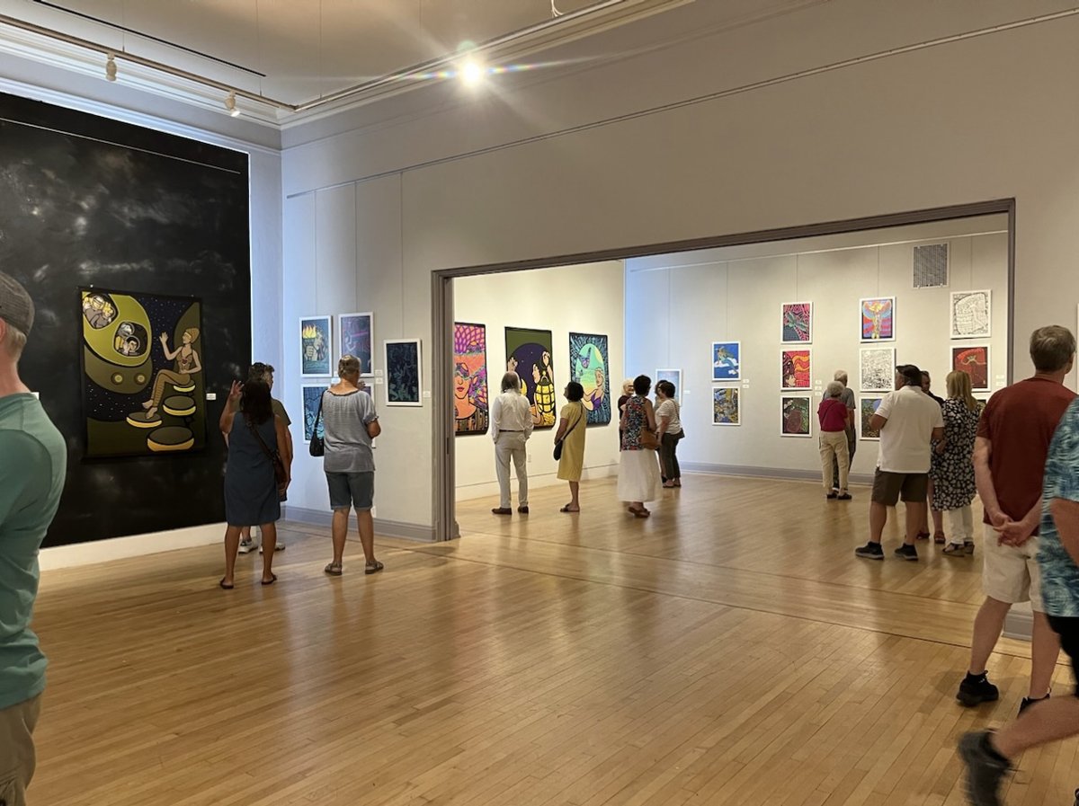 Check out my solo exhibit, Fantastic Scenes in the Galaxy at Museum of Northern California Art open today from 11-5. My posters displayed  in the next room.  Woman on left checking out the 5 footer by holding her hand out like the character. <a href="/Moonalice/">Roger McNamee</a> <a href="/MoonalicePoster/">Moonalice Posters</a> <a href="/trps/">trps</a>