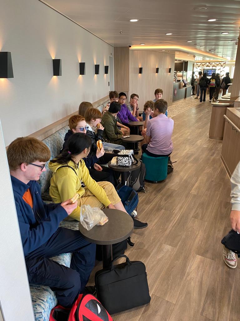 We're on the ferry. Not too much waiting around.