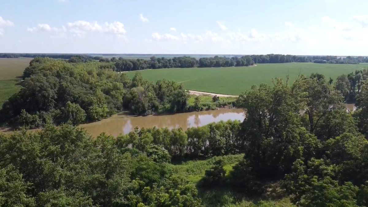 the_60s_at_60's tweet photo. Graball Landing and one of the many vandalized signs marking the site where Emmett Till’s body was pulled out of the river.

Read more: https://t.co/ehecILoy9p https://t.co/iJHsNlIZSJ
