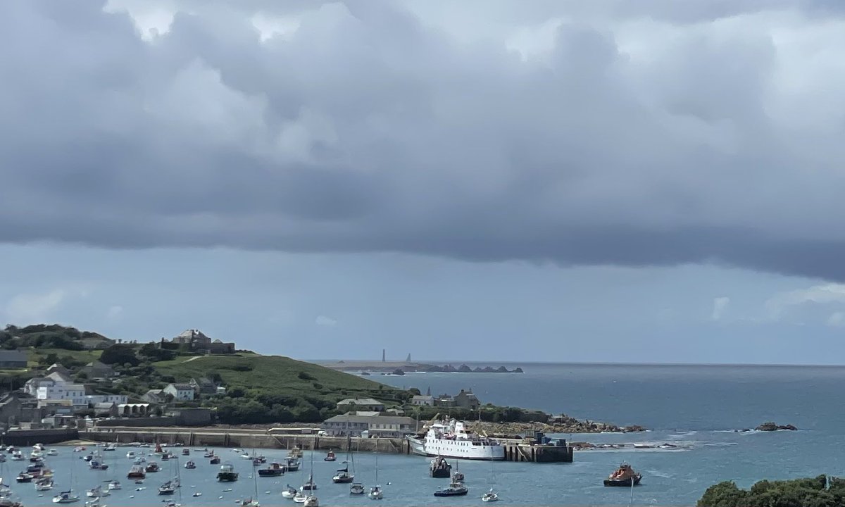 The lead #RolexFastnetRace multi-hull on the horizon, racing past the islands at around 30 knots #Scilly