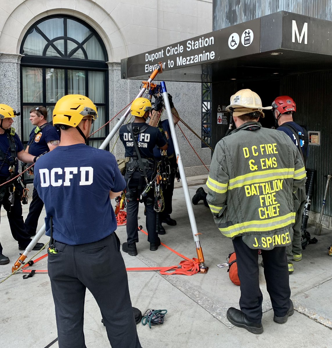 dcfireems's tweet photo. Technical Rescue DuPont @wmata station elevator. 1 person in stalled elevator 30 feet below grade in blind shaft. Firefighters lowering by rope to access and remove individual. #DCsBravest https://t.co/BDv6kMEM2X
