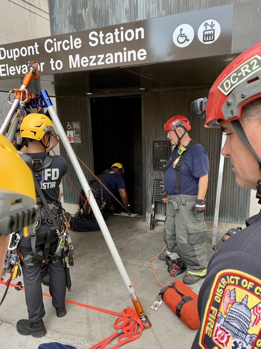 dcfireems's tweet photo. Technical Rescue DuPont @wmata station elevator. 1 person in stalled elevator 30 feet below grade in blind shaft. Firefighters lowering by rope to access and remove individual. #DCsBravest https://t.co/BDv6kMEM2X