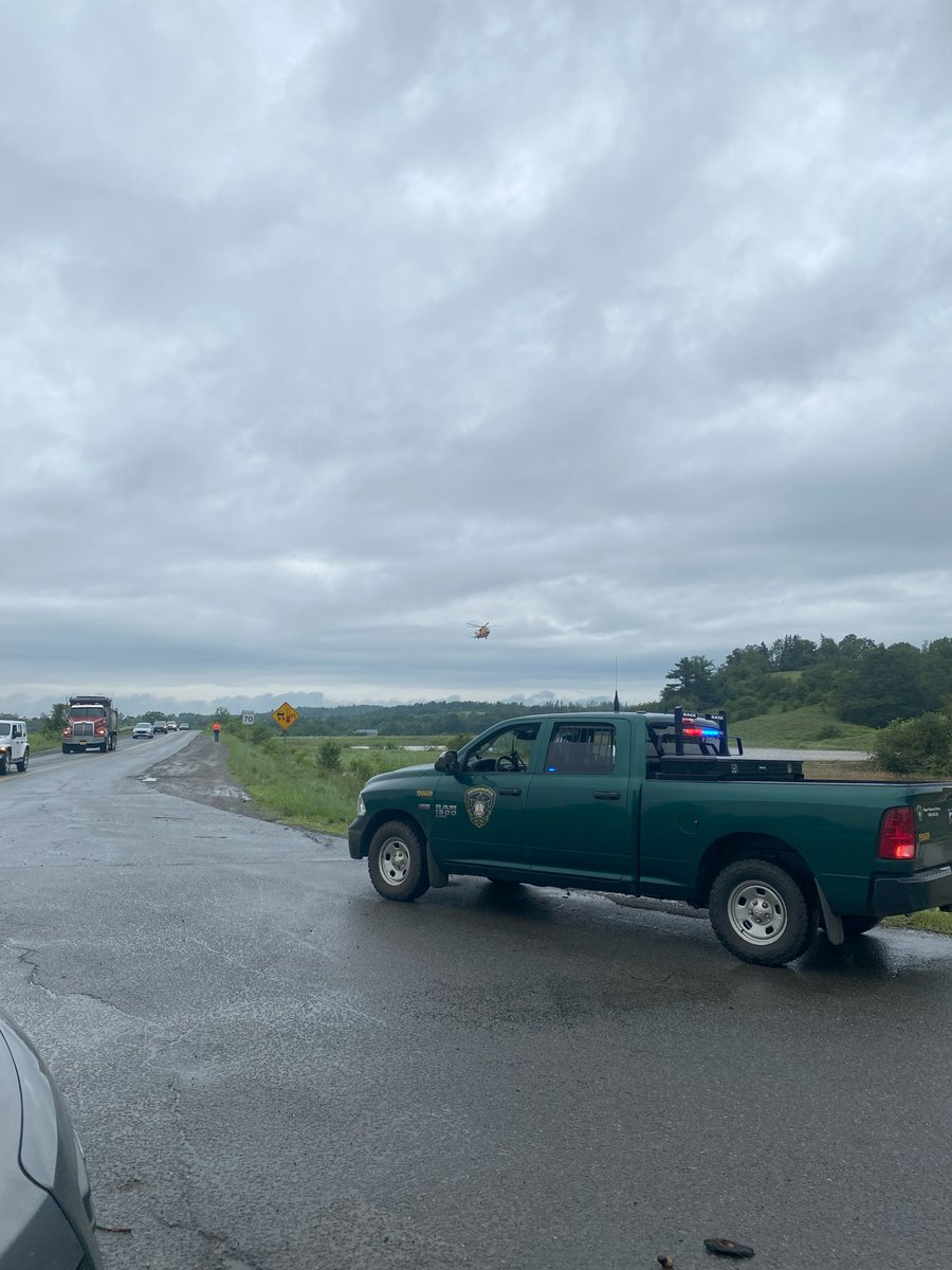 hfxjrcc's tweet photo. On 22 July, 413 #SAR Squadron conducted multiple rescues in conjunction with @RCMPNS and @HalifaxSAR. In one mission SAR Techs were lowered into the rushing flood water and air lifted a stranded camper to safety. #RESCUE https://t.co/0744sNFSGU