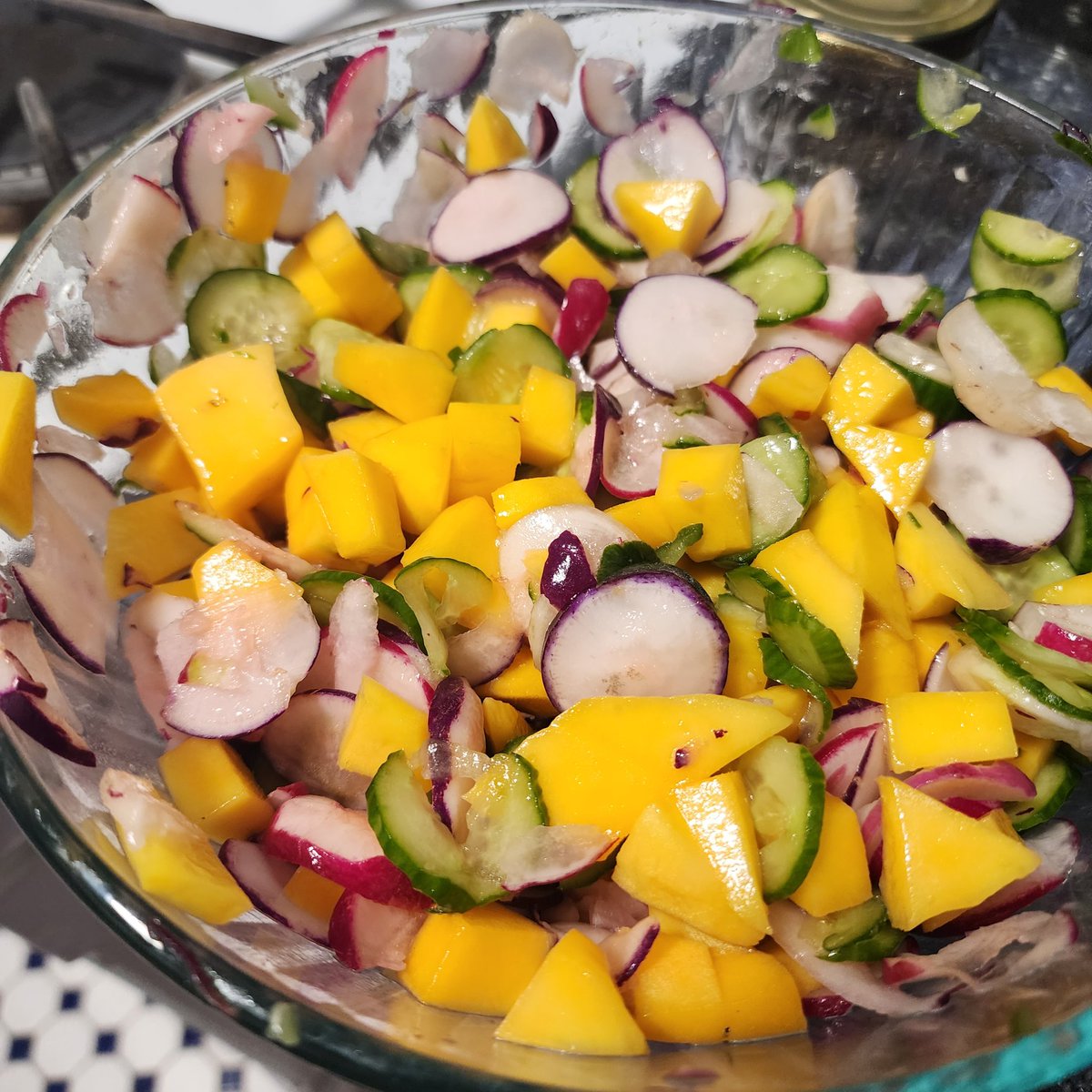 Not all salads have to contain leafy greens...looking forward to having this beautiful mango, cucumber, and (3 types of) radish salad with a homemade lemon dressing this week 😋. #EatingWell #HealthyEating #PlantBasedEating