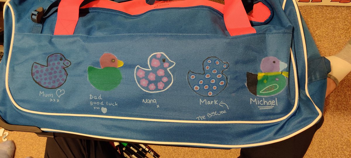 MichaelHawley95's tweet photo. Sister leaves for #wsj2023 this week and we've all decorated her bag with #unit12 @derbyshirescout ducks. I'm particularly happy with my @1stRipleyScouts Cub duck. (please note silver award and wing of badges). https://t.co/0Mame4pFrN