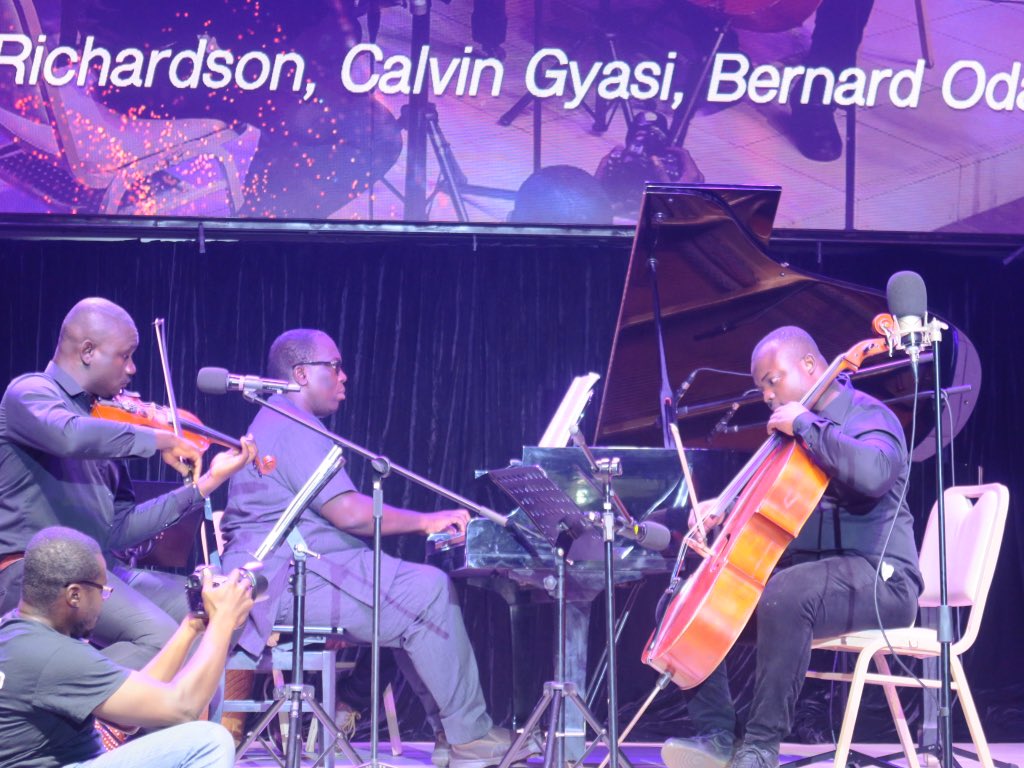 thehudgroup's tweet photo. πΆ Harmonious Trio πΆ
Julius Richardson, Calvin Gyasi, and Bernard Odai astound with Mendelssohn's Piano Trio in D Minor. A captivating performance! πΉπ»β¨
#TheHuDGroup
#HopeAliveConcert #HuD20thAnniversary #ClassicalMusicMagic https://t.co/YC4jmV6XgL