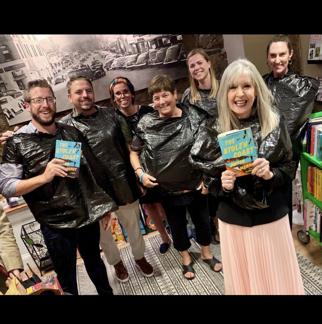 See what we’re wearing? After @DwyerMurphy ‘s fab event at @newtonville_books where I got to ask abt his brilliant THE STOLEN COAST: plot twist! It began to rain. Torrential, w/lightning & thunder. How to leave? Genius owner Mary Cotton doled out… Trash bags!